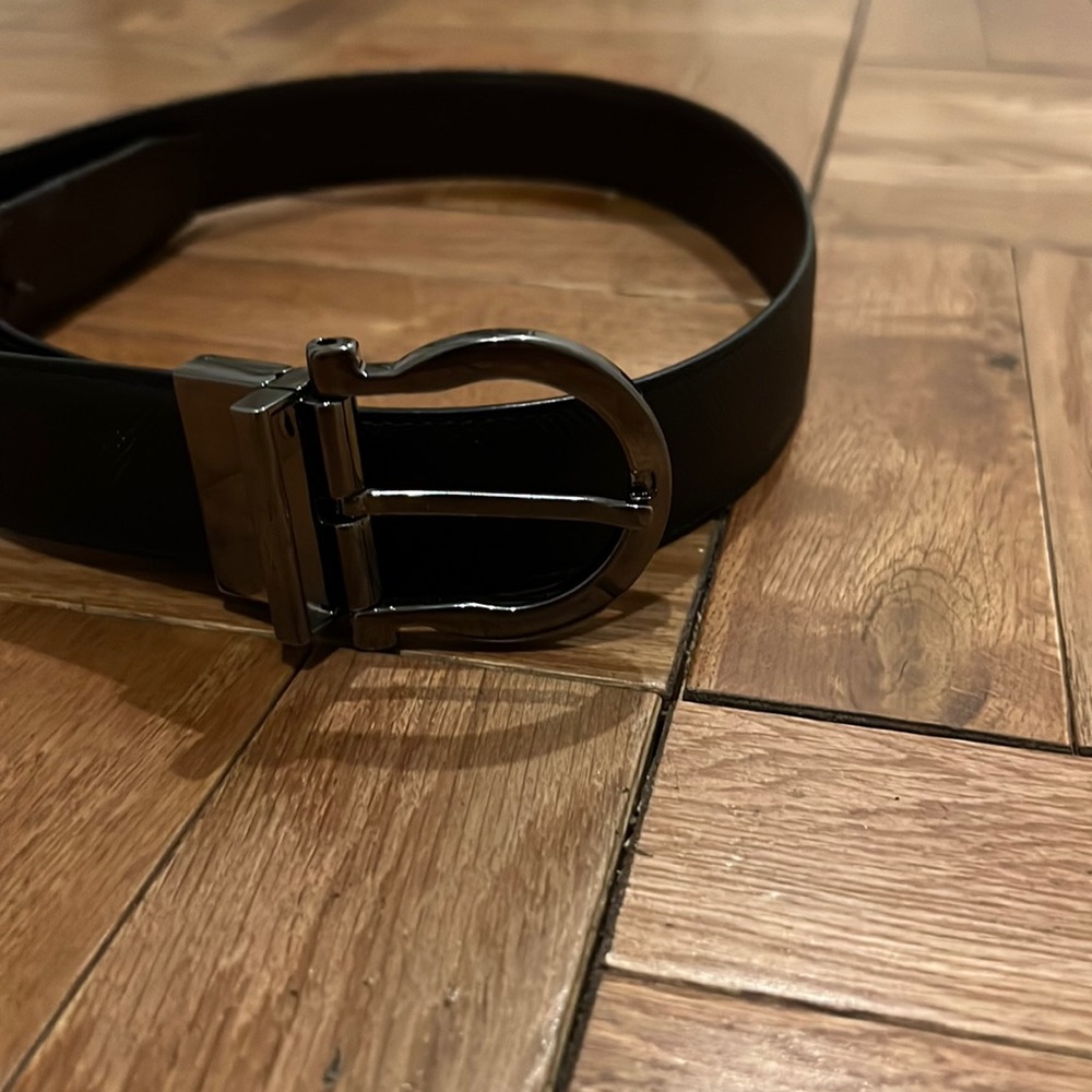 Men’s reversible (black and dark brown) Ferragamo belt, size 30. No longer wear